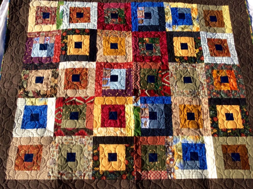 Designed and pieced by Terry and Tierney Hogan, quilted by Betty Anne Guadalupe