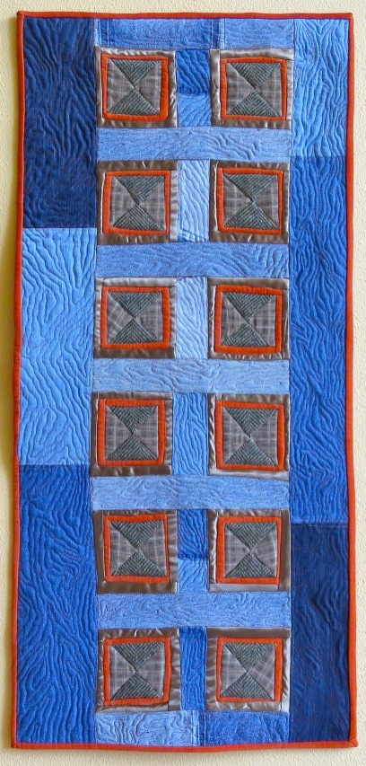 Recycled Door (2017) by Tierney Davis Hogan, quilted by Betty Anne Guadalupe, photographed by Marion Shimoda